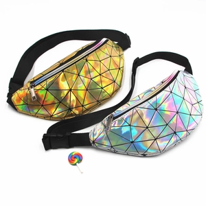 Detail of geometric holographic waist bags in gold and silver laser finish with chain
