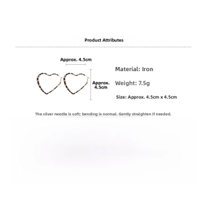 Detail view of leopard print heart earrings showing 4.5cm size and 7.5g weight specs