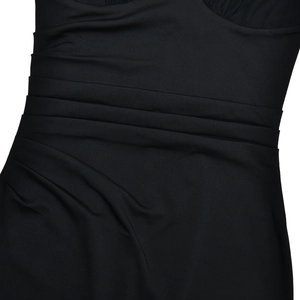 Detailed close-up of ruched and pleated waist design on a black tube dress
