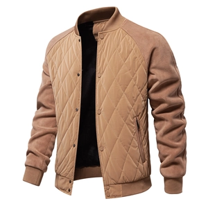 Detailed close-up of men's quilted jacket featuring diamond stitching and thick fleece texture