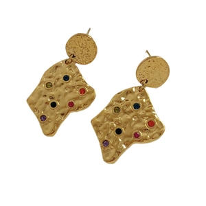 Textured gold geometric earrings with vibrant colorful gemstones on a white background