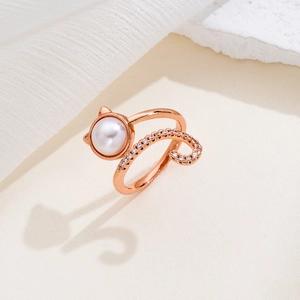 Fashionable rose gold cat ring with pearl and cubic zirconia on elegant stone base