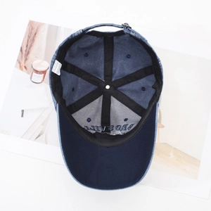 Washed navy cotton baseball cap interior view with sweatband and 100% cotton label