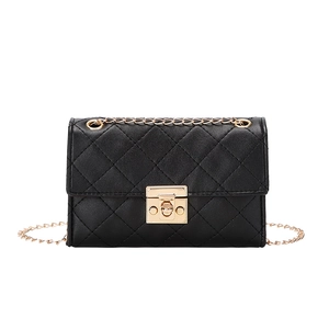 Elegant black quilted crossbody bag with gold chain strap and metallic lock closure