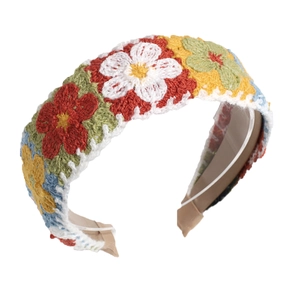 Handmade knitted floral headband in colorful bohemian style for women and girls
