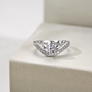 Macro detail of V-shaped S925 silver ring featuring oval zircon and pavé setting