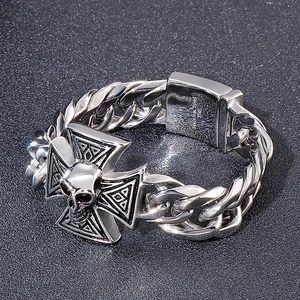 Close-up of 316L stainless steel gothic bracelet with skull and iron cross charm