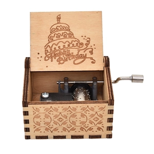 Hand-cranked wooden music box with Happy Birthday engraving and metal movement inside