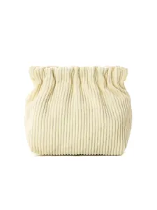 Detailed texture of beige corduroy storage pouch with spring-closure gathered top