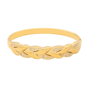 Bracciale a foglie intrecciate dorate con cristalli pavé e finitura in acciaio lucido