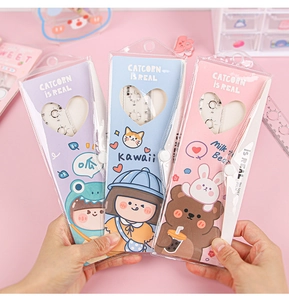 Close-up of cute cartoon stationery set featuring 20cm ruler and compass in pink packaging