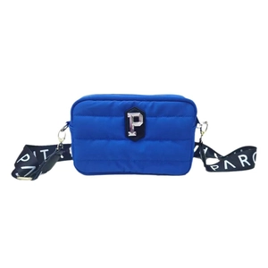 Quilted blue nylon crossbody bag with metallic P logo and black PARTY strap on white back