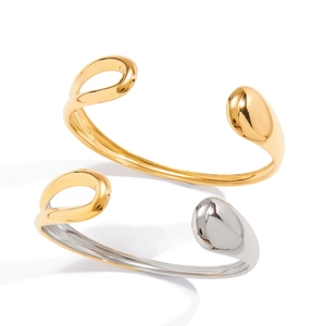Minimalist 18K gold and silver two-tone stainless steel open bangle with sleek fluid design