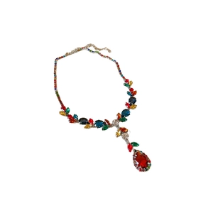 Colorful zircon leaf necklace with a large red teardrop pendant on a silver chain