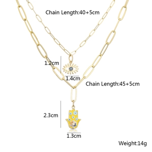 Detailed dimensions of 18K gold Hamsa Hand and Evil Eye double layer necklace