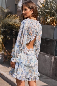 Floral mini dress featuring backless cutout design and tiered ruffle hem details