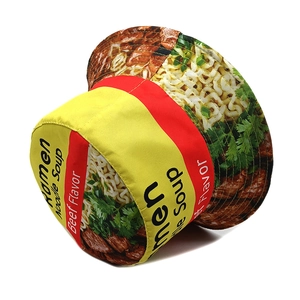 Detail view of the creative ramen noodle soup print on a yellow bucket sun hat