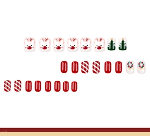 Detailed view of 22 Christmas press-on nails featuring reindeer and tree patterns