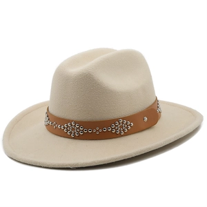 Close-up of wool fedora with a brown leather band and silver rivet decorative patterns