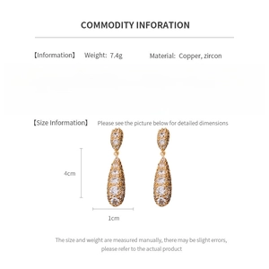 Size and material detail for teardrop tassel earrings with copper and zircon measurements