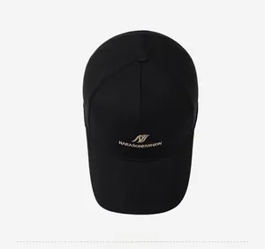 Close-up of golden NARASONFASHION embroidery on a classic black six-panel baseball cap
