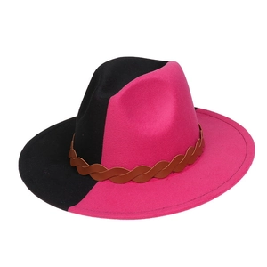 Detail of gradient pink and black wool fedora hat with brown woven decorative band
