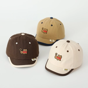 Detailed view of baby baseball caps with cute cat embroidery and contrast piping finish