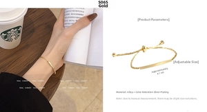 Detail of golden adjustable pull-style bracelet with Never Dream engraved bar