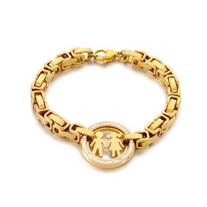 Iced out gold chain bracelet with diamond-encrusted boy and girl charm pendant