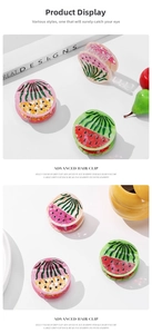 Macro detail of high-quality watermelon and papaya acetate shark hair clips on white surface
