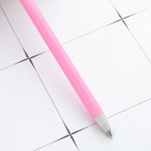 Pink ballpoint pen for students with a smooth plastic barrel and fine metal tip detail