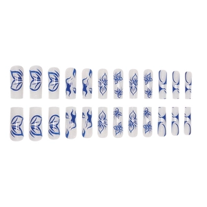 Long coffin fake nails featuring blue butterfly art and sparkling white base coat