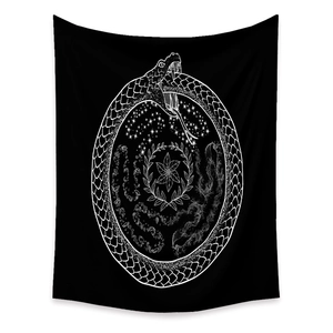 Detail of Ouroboros snake tapestry with moon and stars mystical wall hanging art