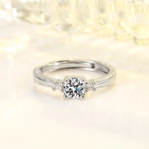 Classic silver couple ring with four-prong set round diamond and milgrain edge decoration