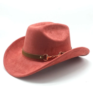 Detail of coral red suede cowboy hat with brown leather band and golden horsebit buckle
