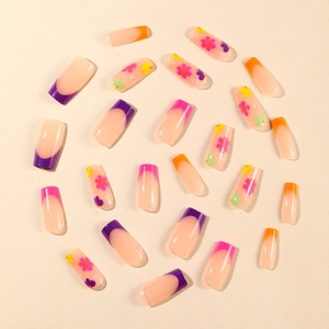 French tip press-on nails with colorful floral prints and medium square shape design