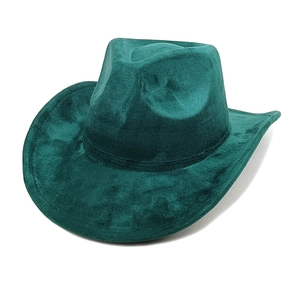 Detailed close-up of dark green faux suede cowboy hat showing rich velvet texture