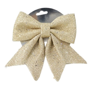 Sparkly gold glitter Christmas bow ornament for holiday tree decoration on white background