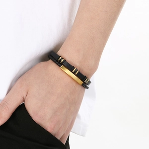 Double-layer braided black leather bracelet with a polished gold-plated metal bar