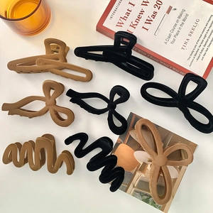 Barrettes à cheveux floquées élégantes aux motifs nœud et géométriques pour coiffures d'hiver
