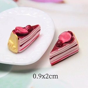 Macro shot of 0.9x2cm miniature resin strawberry cakes for DIY crafts and dollhouses