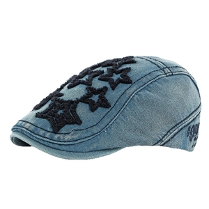 Washed blue denim beret with black embroidered stars in a retro streetwear style