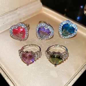 Sparkling heart-shaped zircon rings in five vibrant colors with halo setting