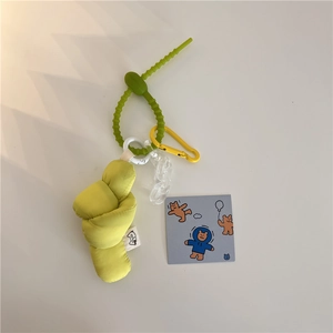 Detail of checkered fabric knot keychain with acrylic chain and yellow carabiner clip