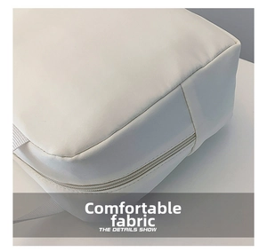 Close-up of durable white nylon fabric and smooth zipper detail on thermal lunch bag