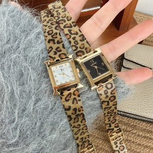 Chic gold H-shaped leopard print watch set featuring black and white dials