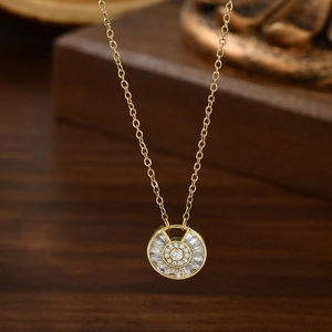 Gold plated collar necklace featuring a geometric lucky charm pendant with micro-set zircons