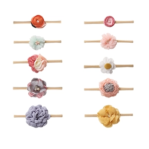 Set of 10 soft nylon baby headbands with colorful handmade silk floral decorations