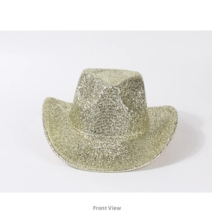 Detailed macro view of the sparkling gold glitter texture on the pink cowboy party hat