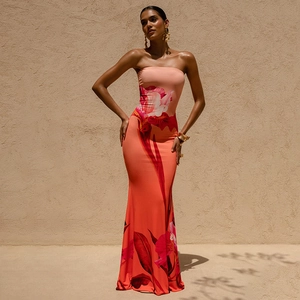 Detail of slim fit strapless maxi dress with vibrant pink and orange floral prints